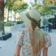 Back View of Blonde Woman Wearing Beautiful Summer Hat with Ribbon Bow - VideoHive Item for Sale