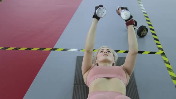 Young woman training in a sports club