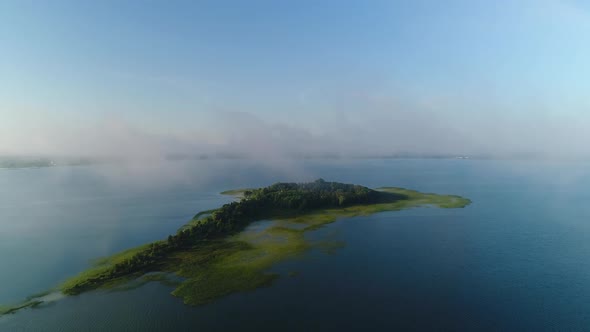 Flight in the Clouds Over the Island of Lake Svityaz