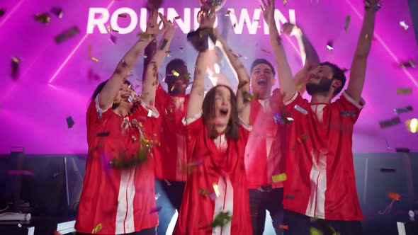 Slow Motion Emotions of Victory the Red Team of Esports Players Rejoices at the Victory in the alt