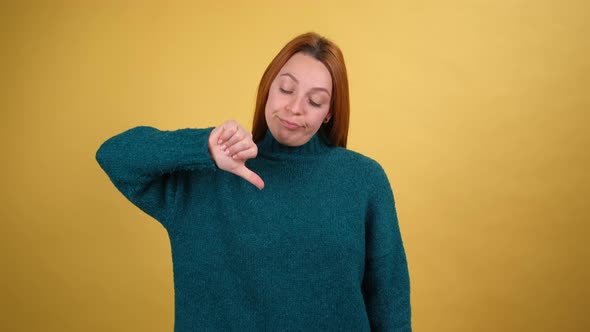 Young Red Hair Woman Posing Isolated on Yellow Color Background Studio alt