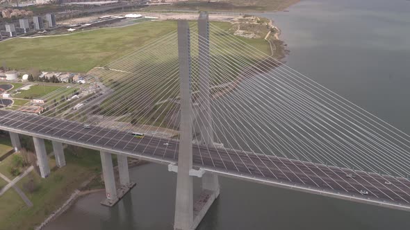 Aerial of Vasco Da Gama Bridge and the river bank