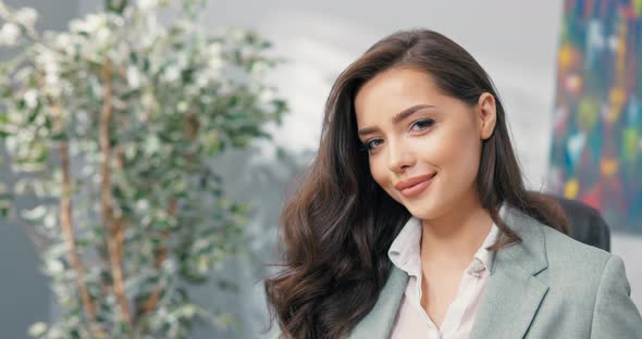 Smiling Flirty Beautiful Pretty Sexy Smiling Brunette with Dark Eyes Woman Elegantly Dressed alt