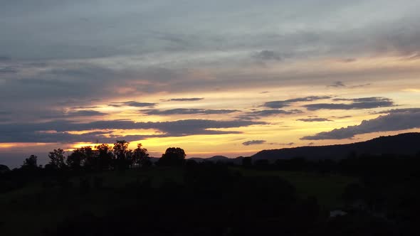 Sunset at farming landscape at countryside rural scenery. alt