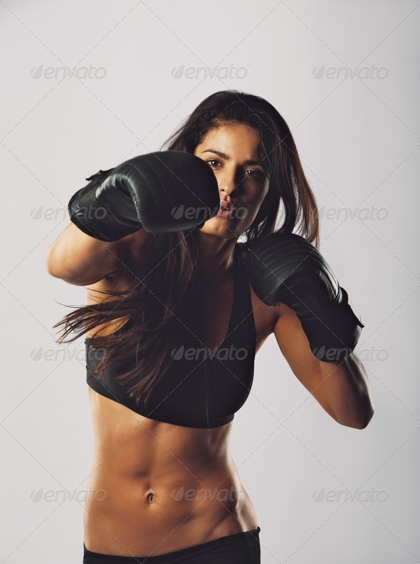 Young sports woman training boxing - Stock Photo - Images