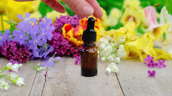 Essential Oil and Flower Extract in a Small Bottle alt
