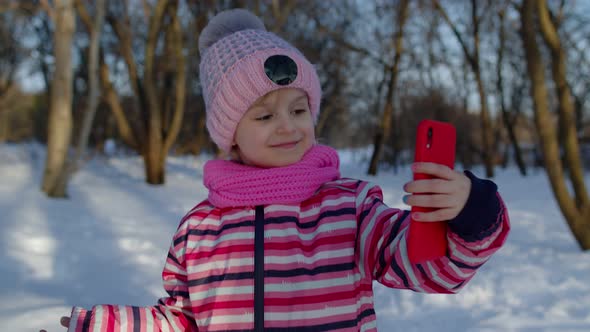 Children Kid Blogger Waving Hello Making Video Call Online Stream on Social Media in Winter Park alt