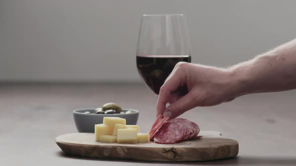 Slow Motion Man Hand Take Appetizers From a Table alt