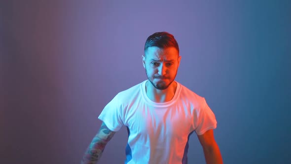 Close Shot of Professional Soccer Football Player Cheering and Screming.  alt