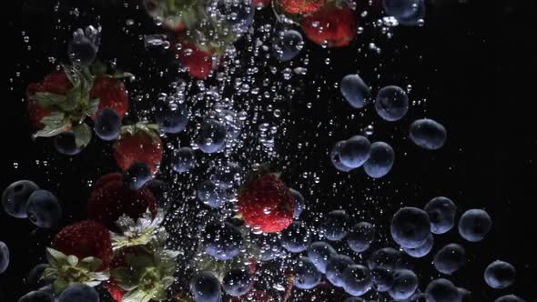 Berries Fall Into the Water Slow Mo