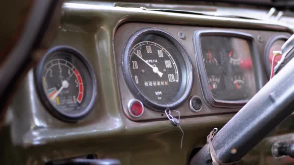 Old Truck Dashboard, Speedometer, and Other Indicators. Vintage Military Vehicle alt