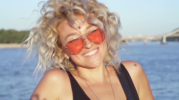 Portrait of happy curly hair woman. 