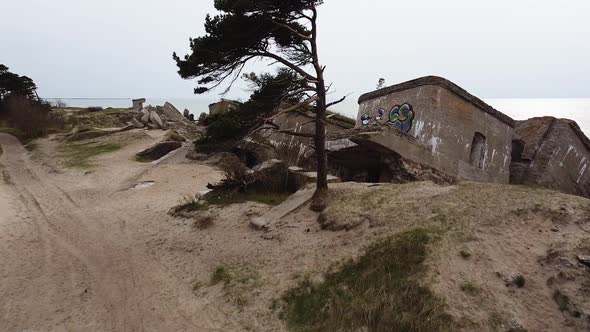Aerial view of abandoned seaside fortification building at Karosta Northern Forts on the beach of Ba alt