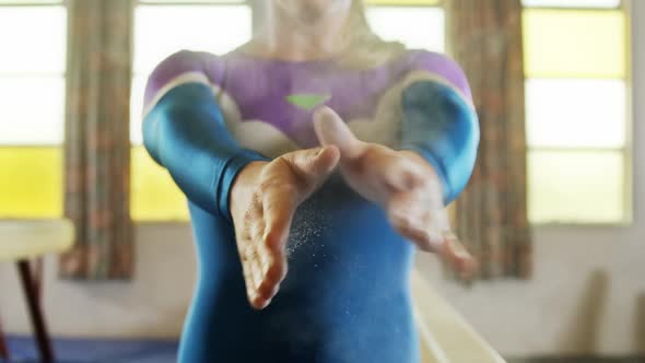 Gymnast practicing a gymnastic alt