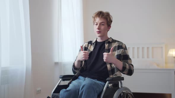 A Handsome Disabled Man is Showing a Thumbup alt