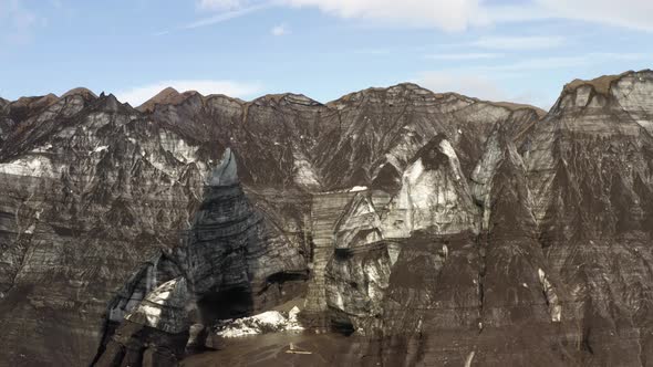Rugged Surface Of The Katla Volcano Crater On Myrdals Glacier In Iceland. aerial drone top-down alt