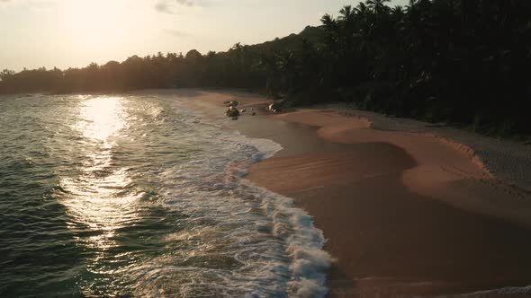 Aerial View of the Sandy Beach During Sunset on the Southern Part of Sri Lanka Island.
