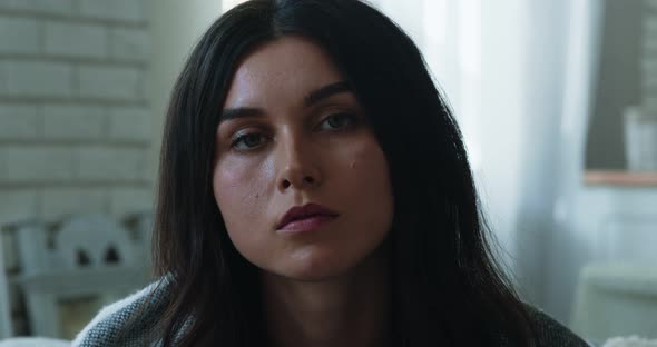 Close Up of Depressed Young Woman Suffering From Autumn Depression at Home alt