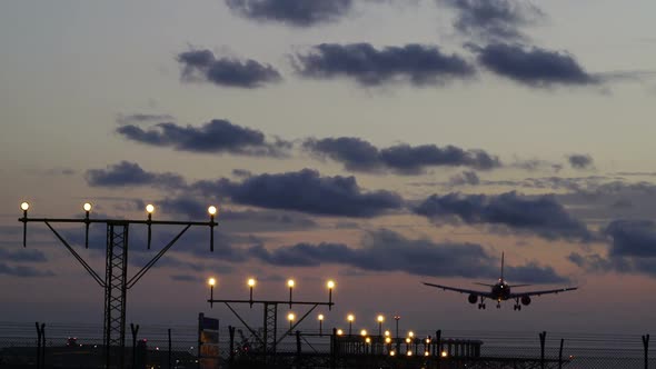Flight Airline Landing at Sunset