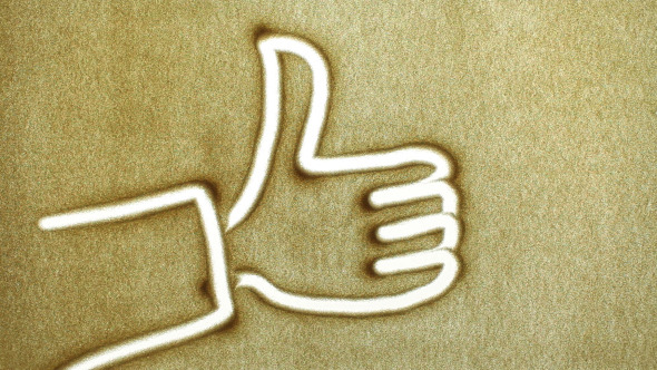 Thumbs Up Drawing In The Sand  alt