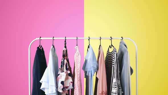 Women's Clothing on Pink and Yellow Background
