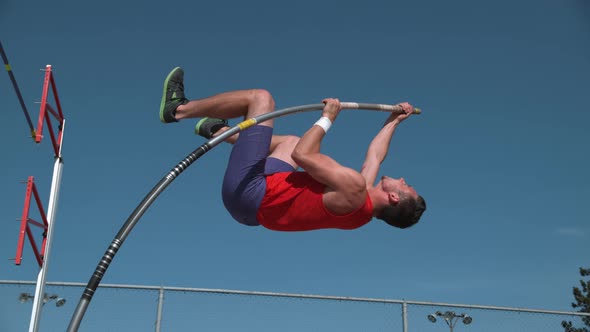 Track athlete doing pole vault in super slow motion, shot on Phantom Flex 4K