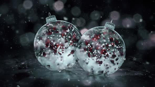 Two Rotating Christmas Grey Noir Ice Glass Baubles red petals background loop