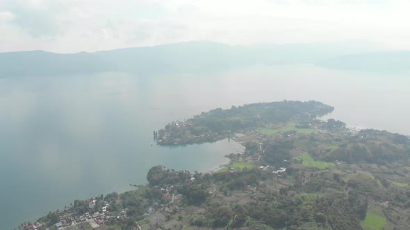 Aerial: lake Toba and Samosir Island from above Sumatra Indonesia. alt