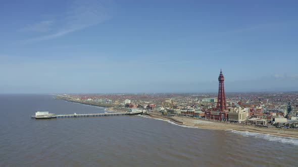 Stunning aerial view, footage of Blackpool Tower  from the sea of the award winning Blackpool beach, alt