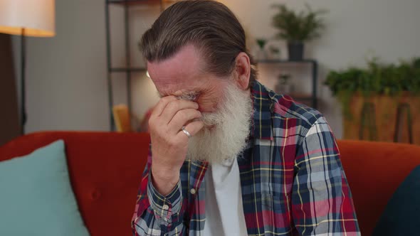 Upset Disappointed Senior Grandfather Wipes Tears and Cries From Despair Unrequited Love Problems alt