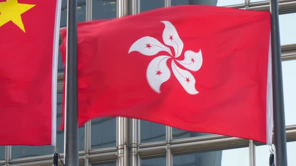 Flag of Hong Kong and China Flag Waving in the Wind alt