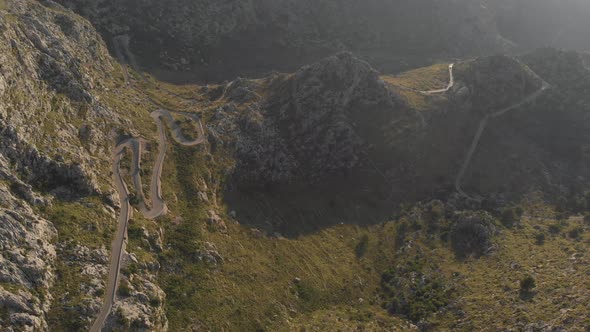 Aerial view of Road to Sa Calobra Beach betwen Tramuntana Mountain in Mallorca, Spain alt
