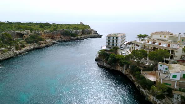 Aerial View of the Fishing Village in Mallorca Spain alt