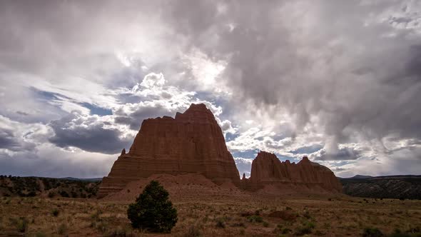 Time lapse of storm clouds moving over the desert in Cathedral Valley alt
