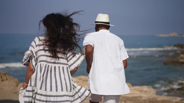 Live Camera Follows Excited African American Boyfriend and Caucasian Girlfriend Running in Slow alt