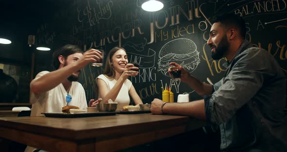 Multiracial Friends Hanging Out in Bar