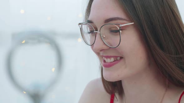 Young Girl Smiles Cute and Lovingly