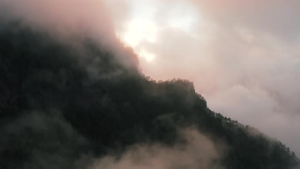 Aerial View Of Mystical Cloud Coverage Over The Mountains in Caldera de Taburiente park La Palma
