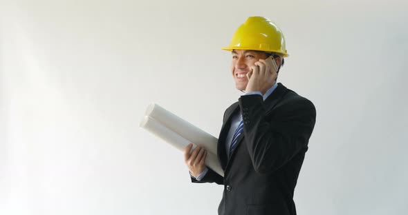 Male Architect Talking On Phone alt