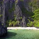 Aerial view of Secret Lagoon with Karst Cliff at Miniloc Island, El-Nido. Palawan, Philippines - VideoHive Item for Sale