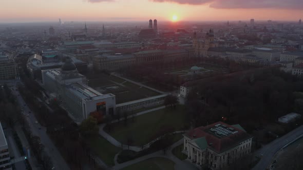 Court Garden in Munich, Germany at Golden Hour Sunset with View Over the Whole City, Aerial Drone alt
