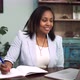 Professional Black Woman Attending a Virtual Interview from Home - VideoHive Item for Sale