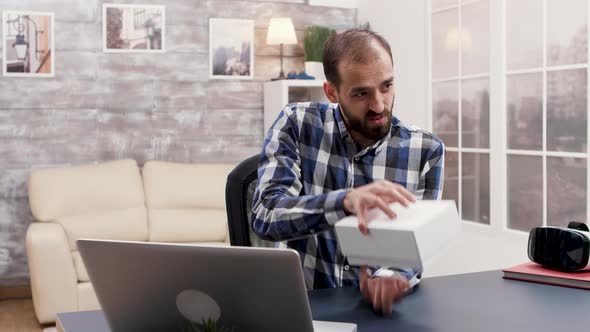 Famous Vlogger Filming a Review for a New Phone on the Market alt