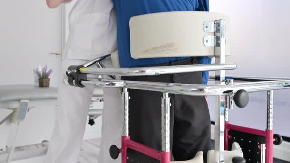 Physiotherapist Assisting a Patient with Amyotrophic Lateral Sclerosis alt