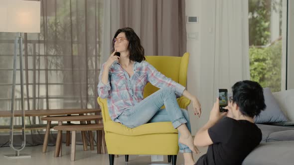 Girl Posing for Photographer Friend at Home Sit on Chair alt