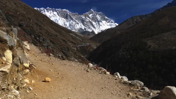 Nepal. Walking the Everest Base Camp Trek. Snowy Mount Everest Is Seen in the Background.  alt