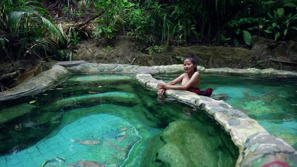 Cute Asian Girl Relaxing in Hot Spring in Slow Motion Thailand