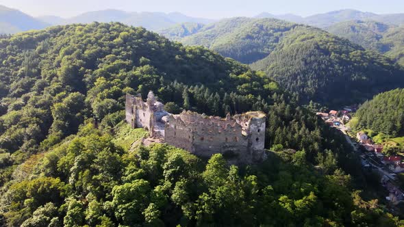 View of Sasovsky castle in Sasovske podhradie village in Slovakia alt