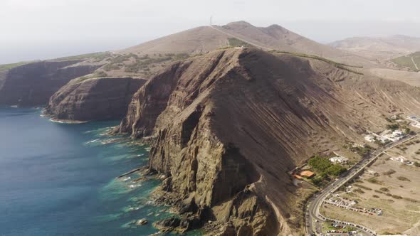Aerial tilting down showing Porto Santo Island, Madeira, Portugal alt