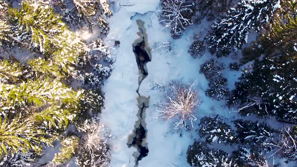 Not Frozen Waterfall in Winter From the Air in